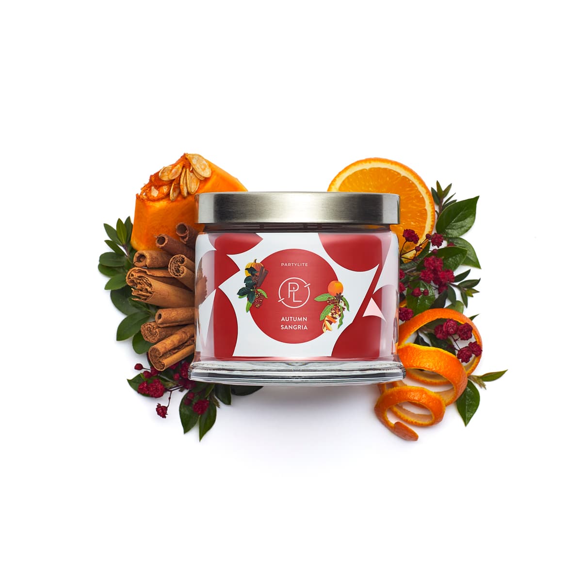Autumn Sangria 3-wick Jar Candle with sliced fruit and leaves against a white background.