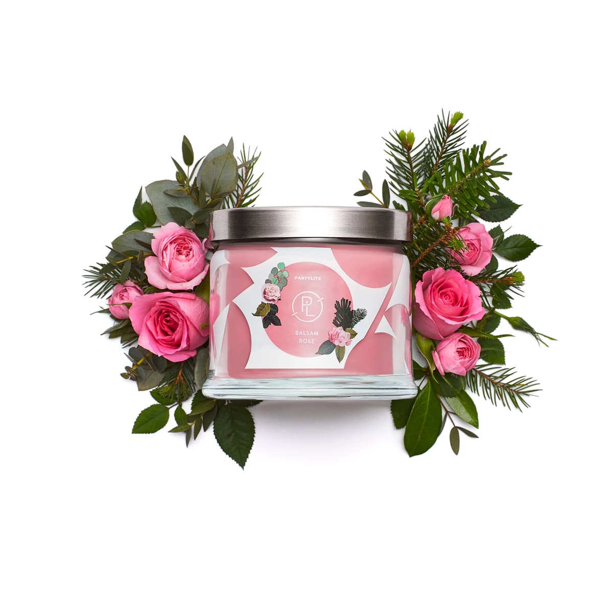 Balsam Rose 3-Wick Jar Candle surrounded by pink roses and leaves against a white background.