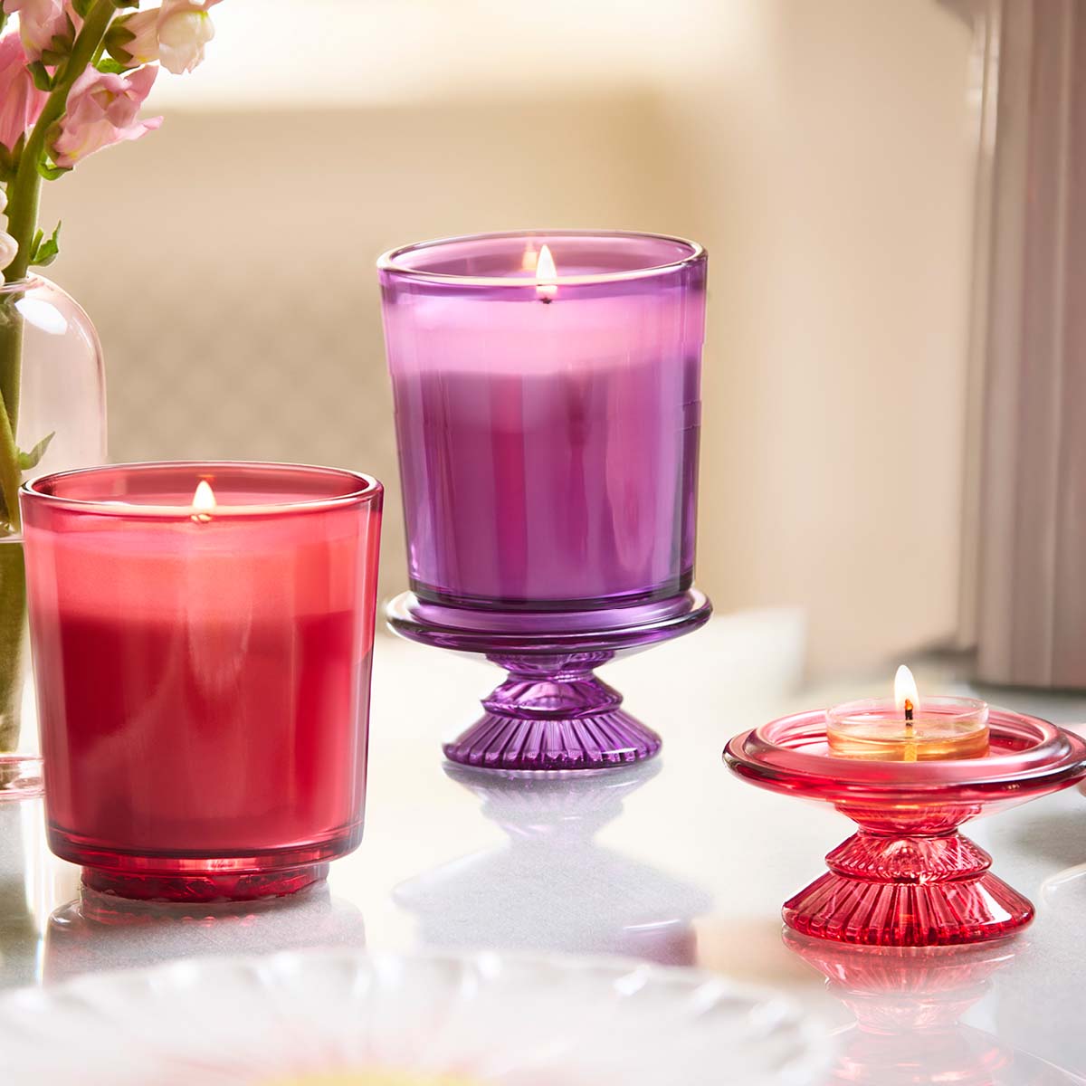 Wildflower Walk Specialty Jar Candle shown with another Specialty Jar candle on a light surface with a beige background.