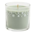 Winter Morning Mini Jar Candle pale green with holiday garlands decorating the top of the glass jar.