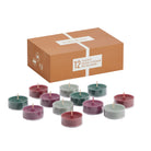 Festive Folklore 12-Piece Tealight Sampler, colorful tealights beside the tealight box against a white background.